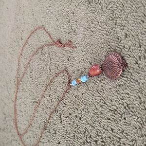 Copper toned charm necklace